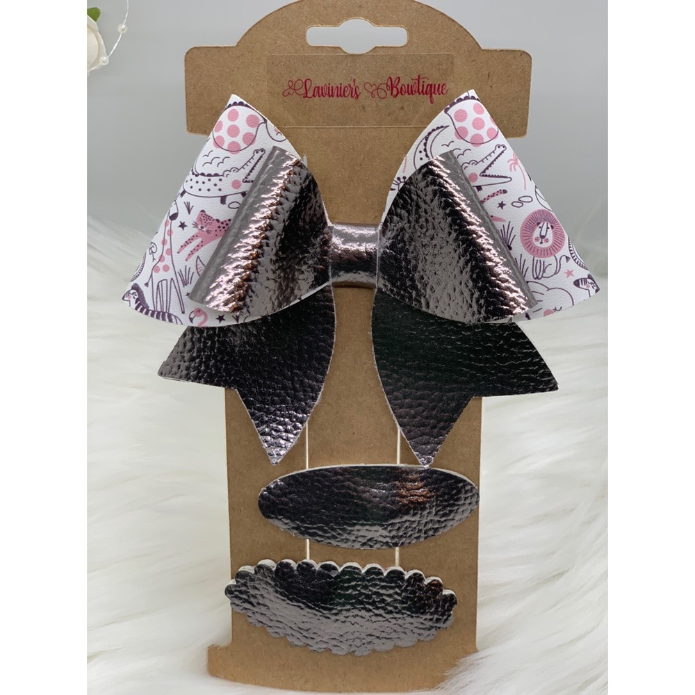 Safari animals print and  chrome faux leather bow